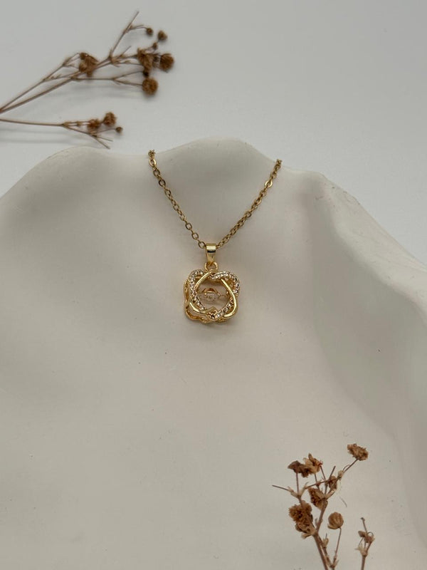 Twistelle – Gold-Toned Crystal Pendant Necklace