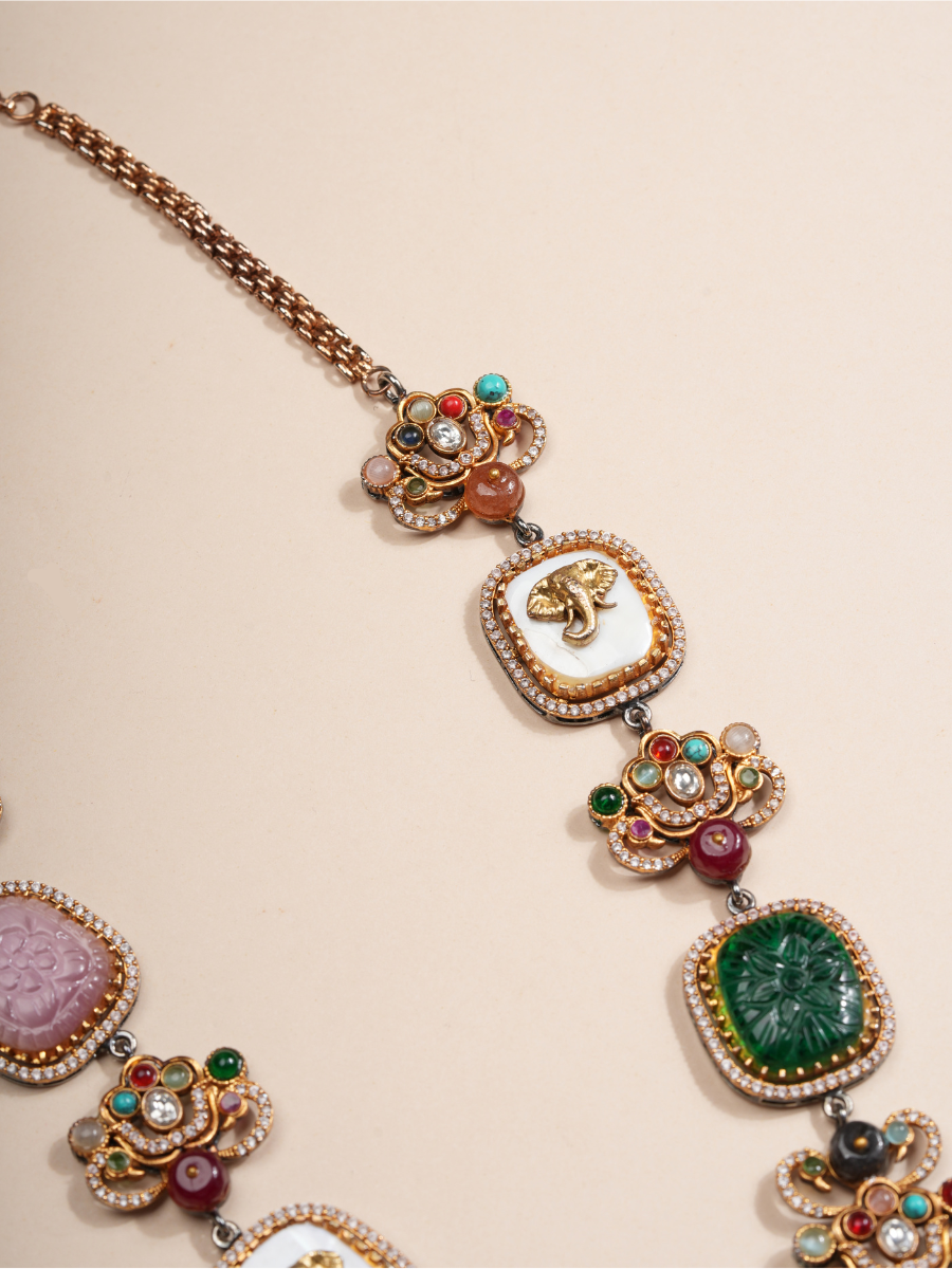 Regal Ganesha Embossed Doublet Stone Necklace